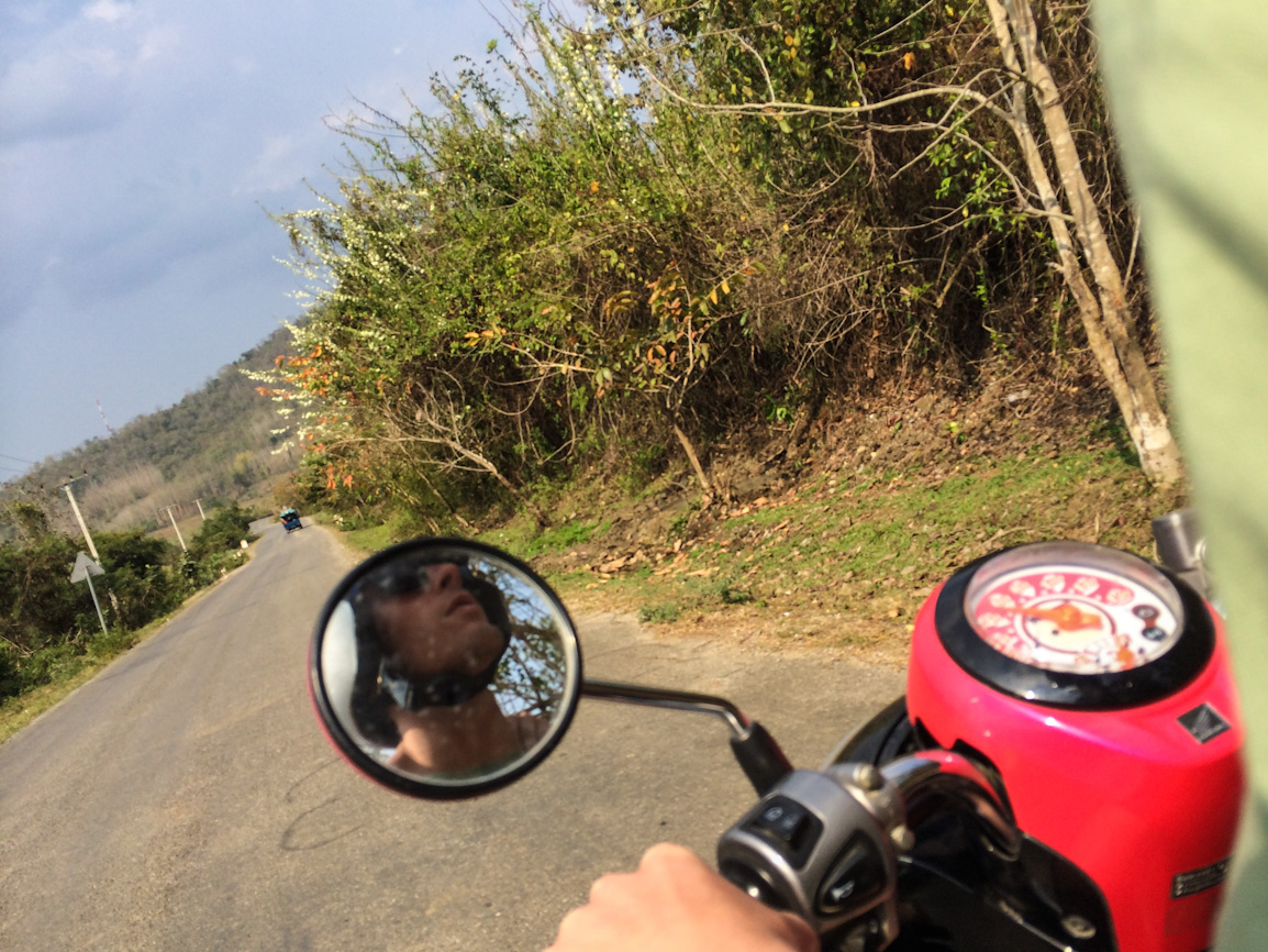 Ride a motorbike to Kuang Si Waterfall