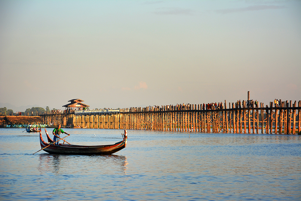 Boat by the U Bein Teak Bridge